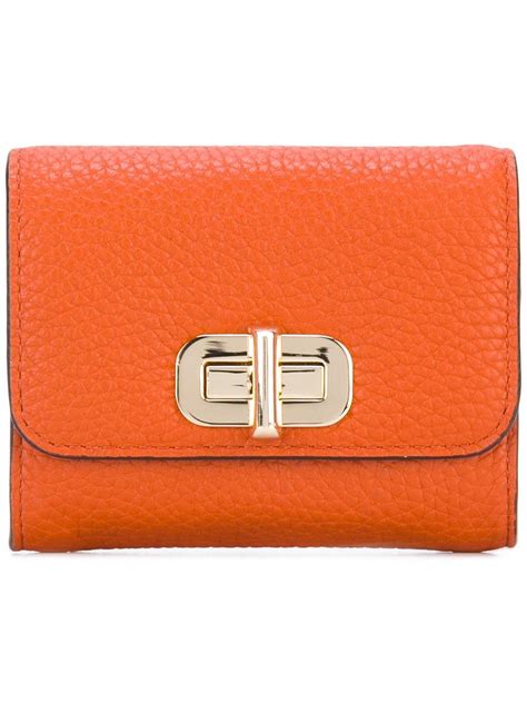 orange michael kors purse small|michael kors orange wallet.